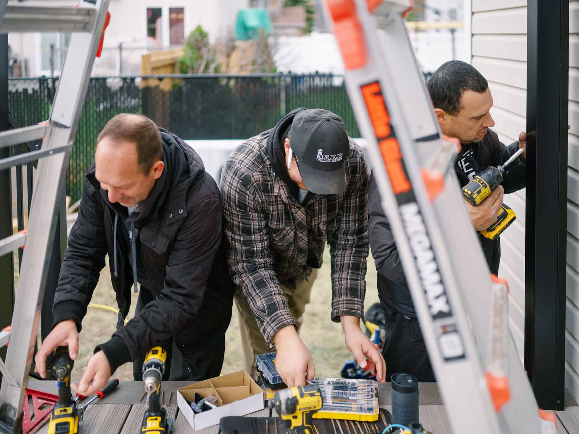 Ottawa Deck Builders team installing deck details on a residential project